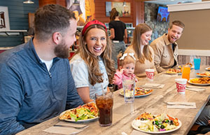Family enjoying Pizza Ranch Buffet